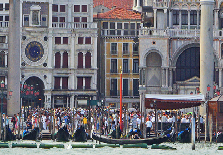 Piazza San Marco bustling with tourists and gondoliers